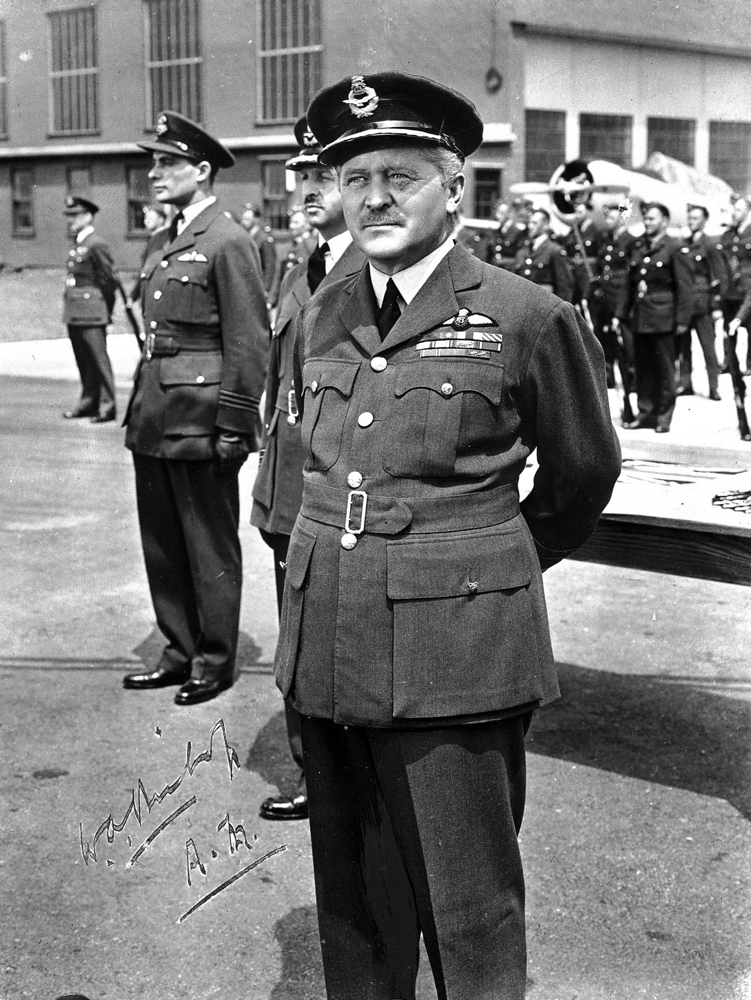 Air Marshal Billy Bishop is on parade during the filming of “Captains of the Clouds” at Uplands in Ottawa, Ontario, on April 5, 1943. During the film, Air Marshal Bishop, playing himself, presented wings to real graduates of No. 2 Service Flying Training School. PHOTO: DND