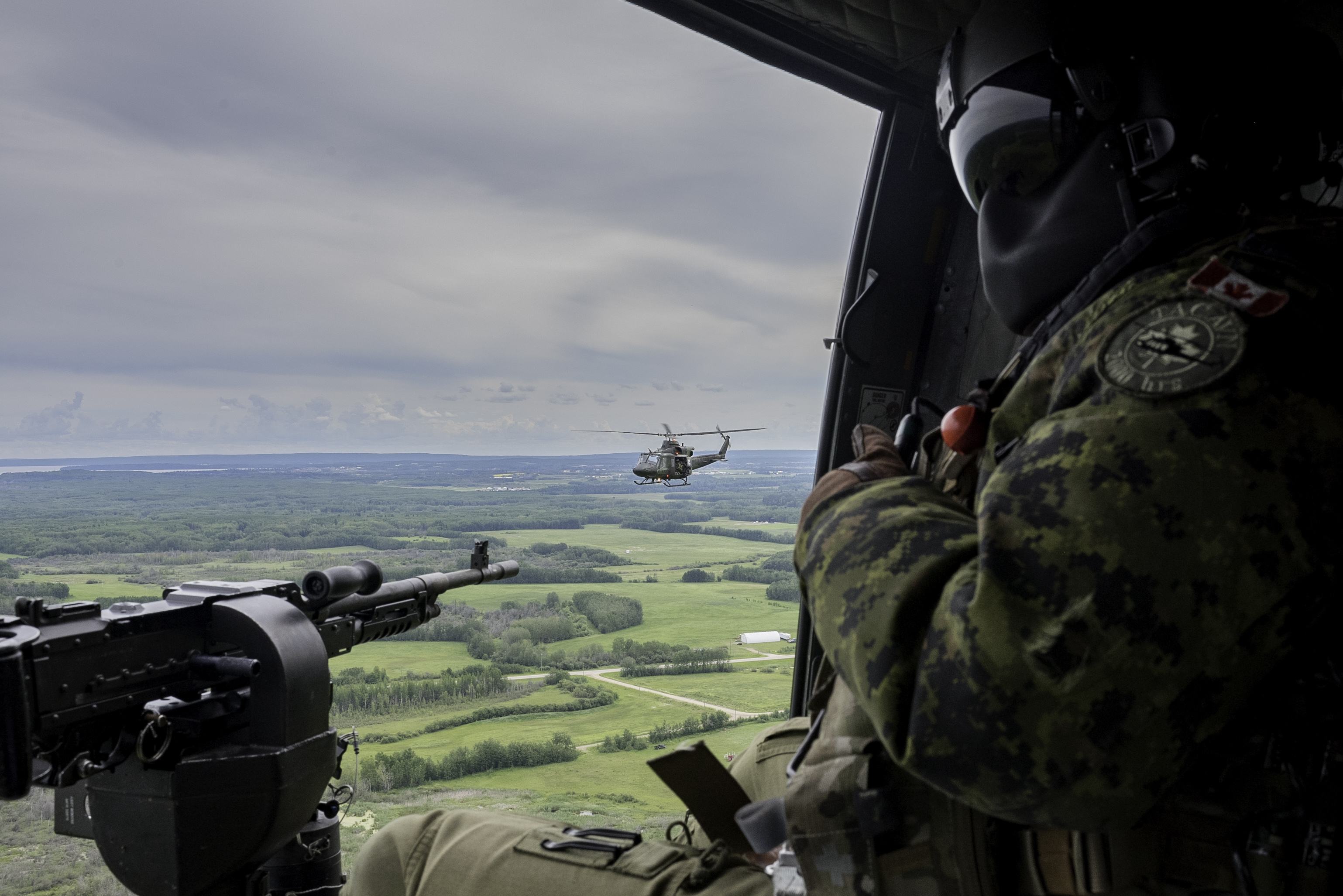 Royal Canadian Air Force CH-146 Griffons from 408 Tactical Helicopter Squadron participate in exercise Gander Gunner near 4 Wing Cold Lake, Alberta, on July 21, 2020. PHOTO: Private Connie Valin