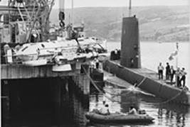 HMCS Ojibwa conducts submerged submarine rescue vehicle trials at the Royal Navy submarine base in Faslane, Scotland on September 1, 1975.