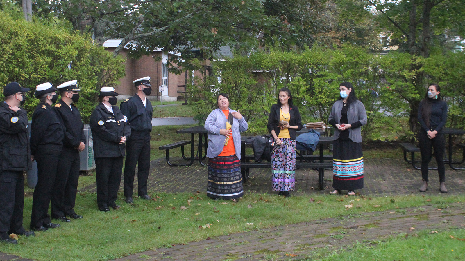 Honorary Captain (Navy) Debbie Eisan leads a smudging ceremony on September 28.