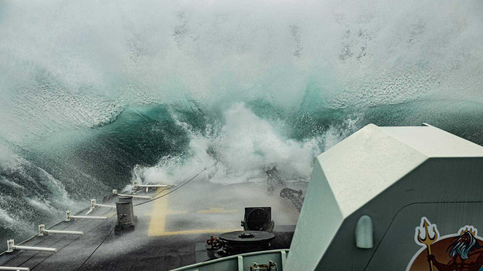 Slide - Waves measuring four to five metres hit the fo’c’sle of HMCS Fredericton