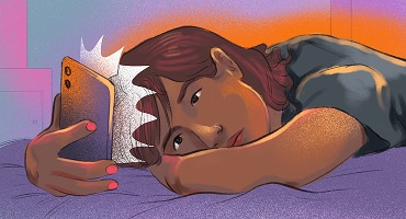 A young woman lying on her stomach on a bed, looking at her phone screen with an upset expression.