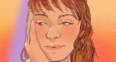 A woman looking upset with her hand on the side of her face